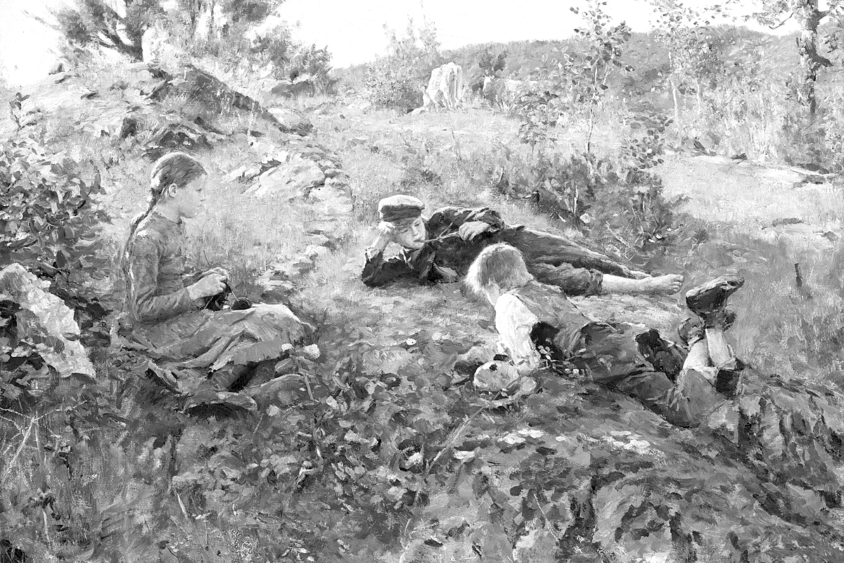 Children lounging in field
