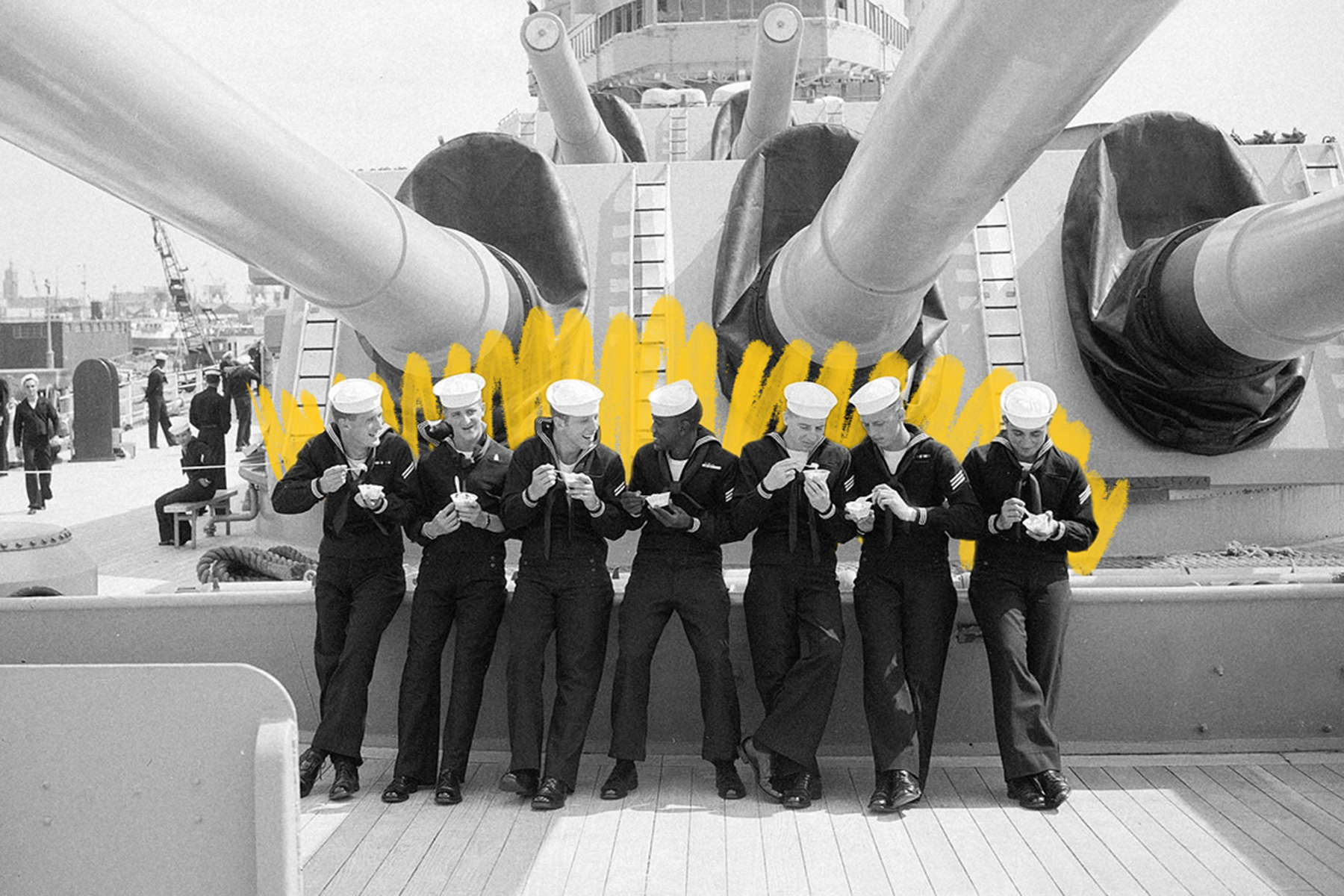 U.S. sailors enjoying a tub of ice cream
